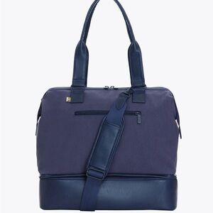 The convertible mini weekender in navy